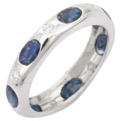 Bague unisexe incrustée de saphir bleu et de diamants en argent sterling