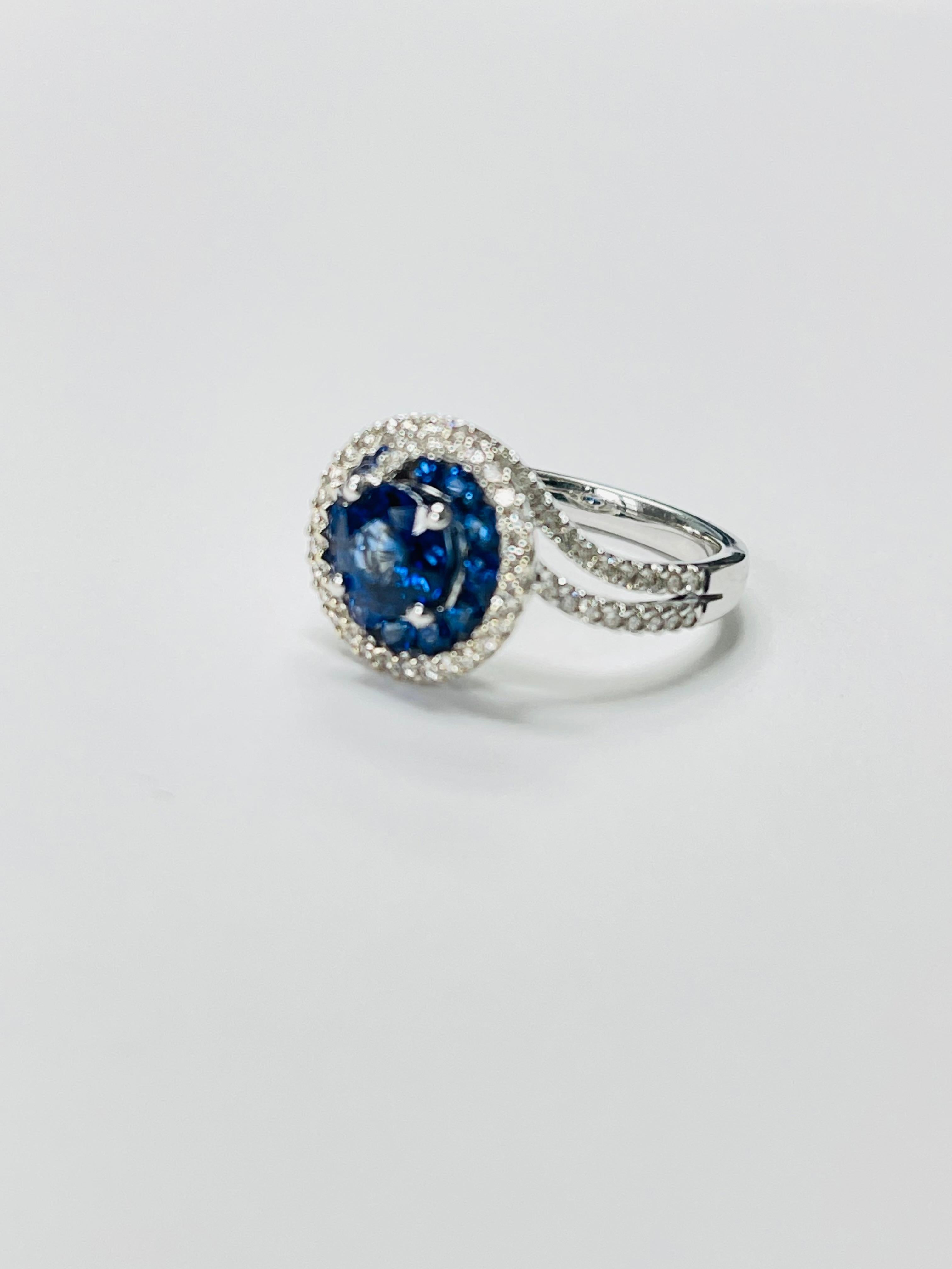Blue Sapphire and Diamond engagement ring beautifully handmade in 18 karat white gold.

The details are as follows: 

Blue sapphire weight : 1.45 carats 
Diamond weight : 0.43 carat 
Metal : 18k white gold 
Ring size : 5 3/4 