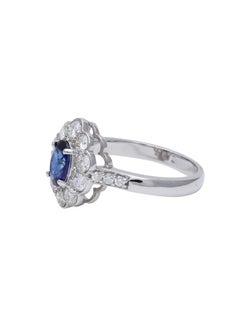 Blue Sapphire and Diamond Engagement Ring in 18 Karat White Gold