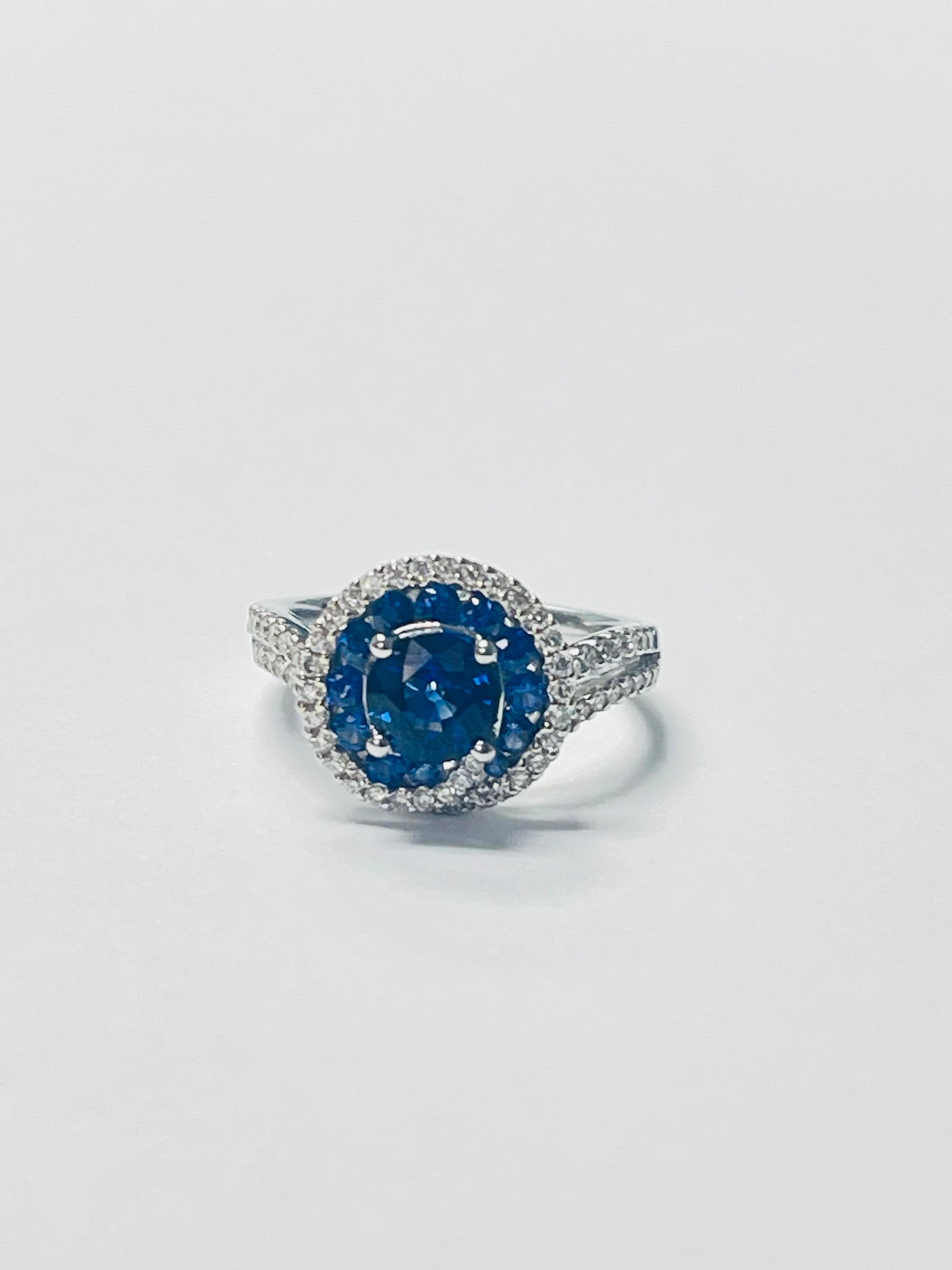 Contemporary Blue Sapphire and Diamond Engagement Ring in 18k White Gold For Sale