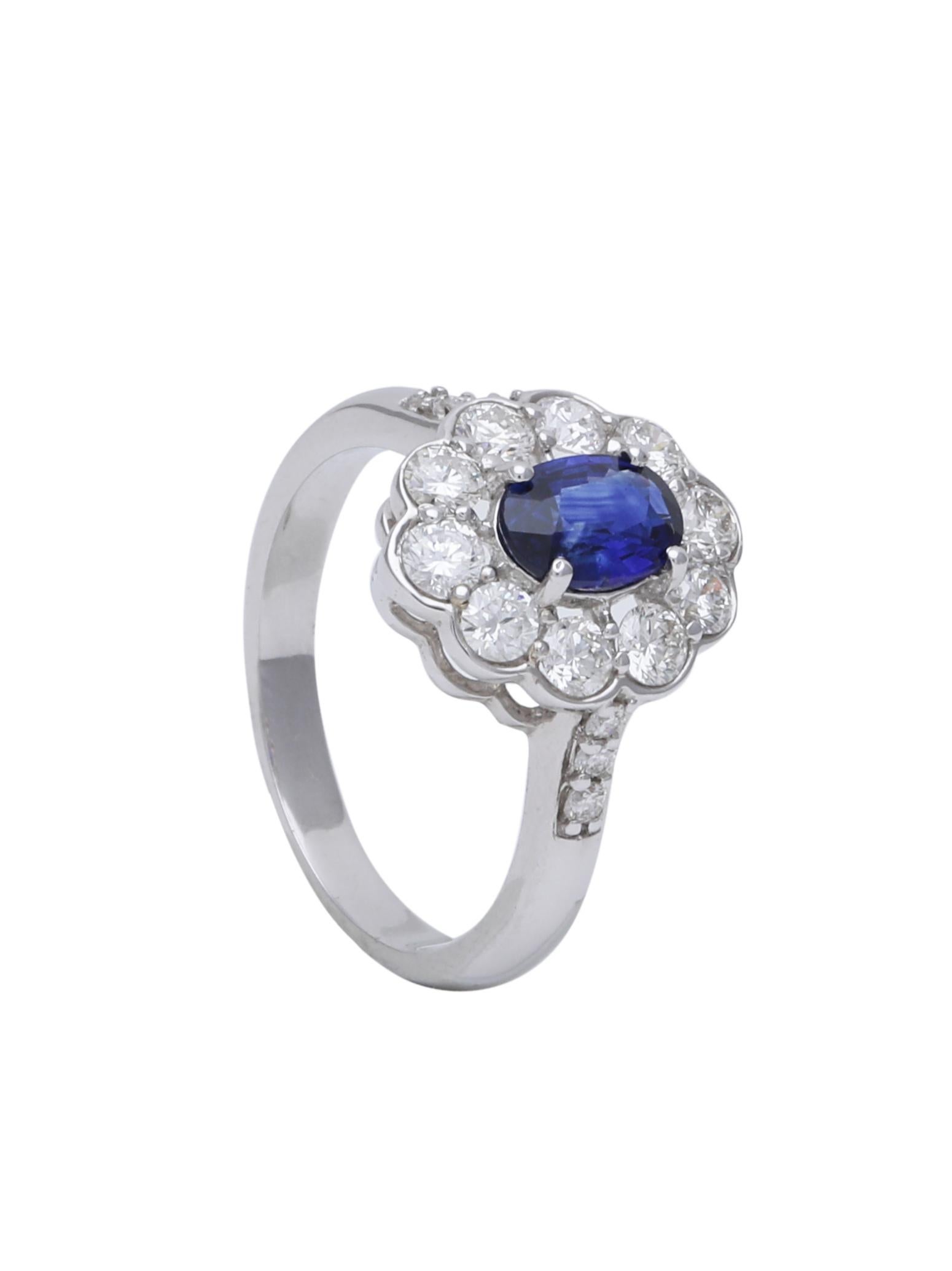 Modern Blue Sapphire and Diamond Engagement Ring in 18 Karat White Gold For Sale