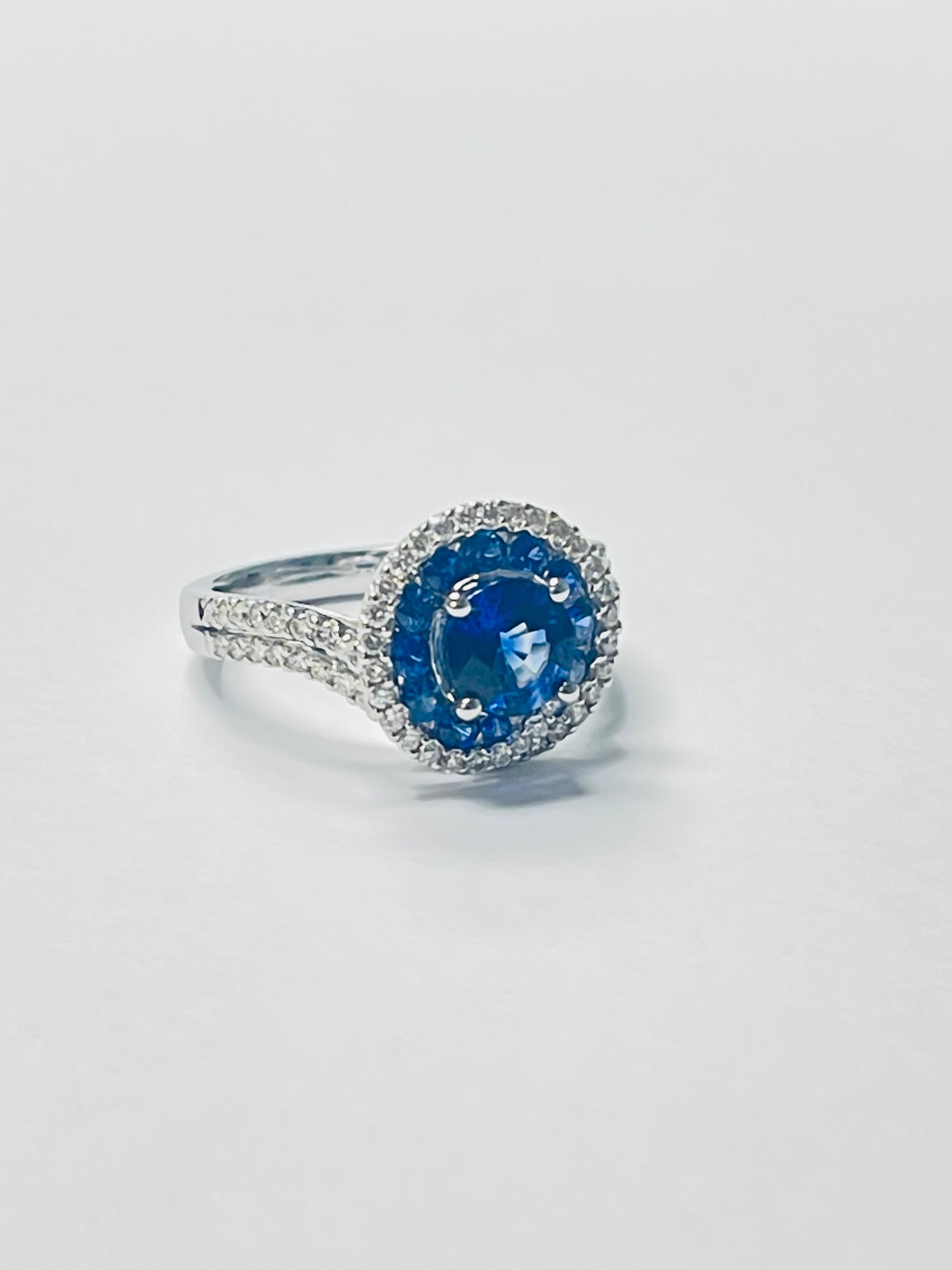 Round Cut Blue Sapphire and Diamond Engagement Ring in 18k White Gold For Sale