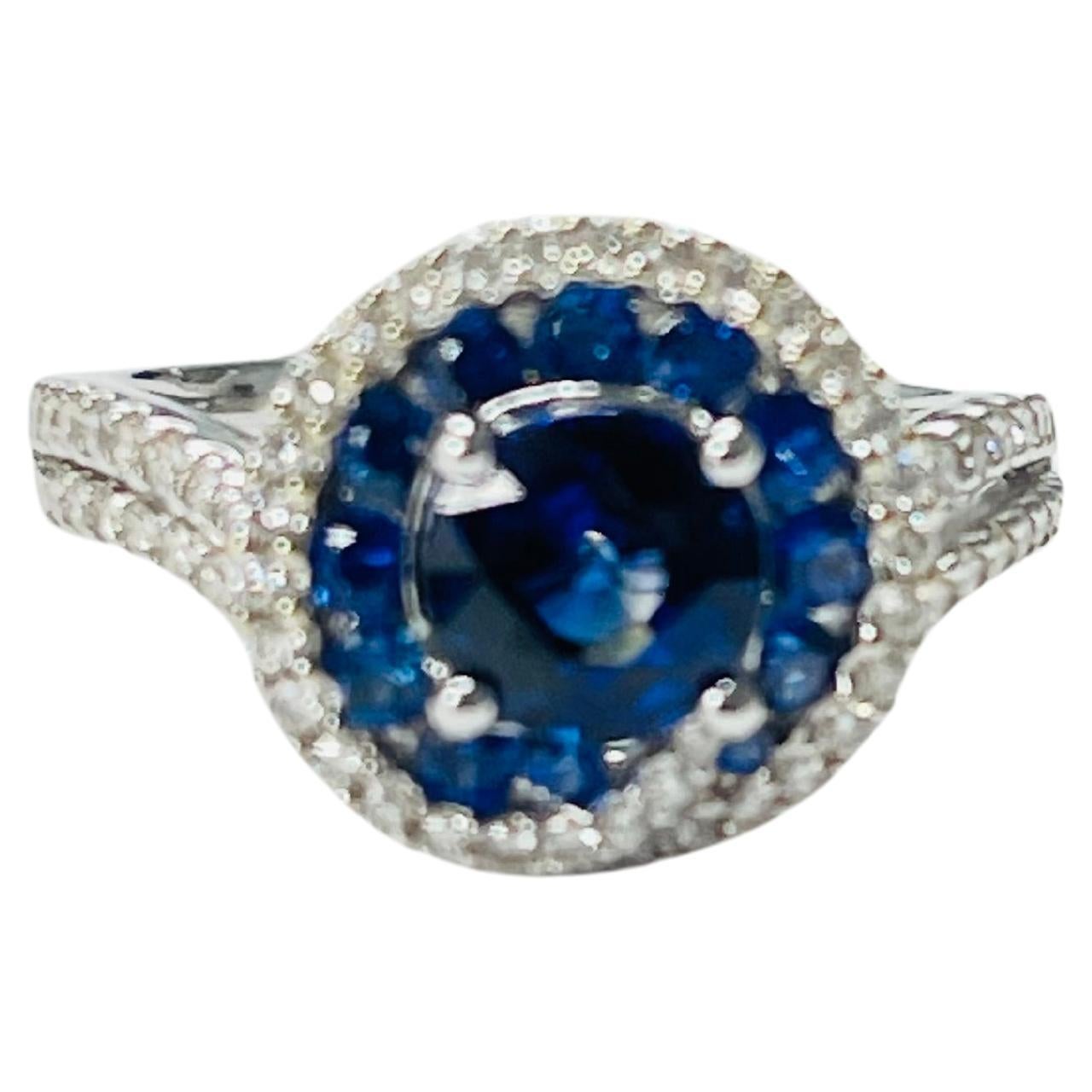 Blue Sapphire and Diamond Engagement Ring In 18k White Gold.