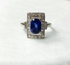 Blue Sapphire and Diamond Engagement Ring in Platinum
