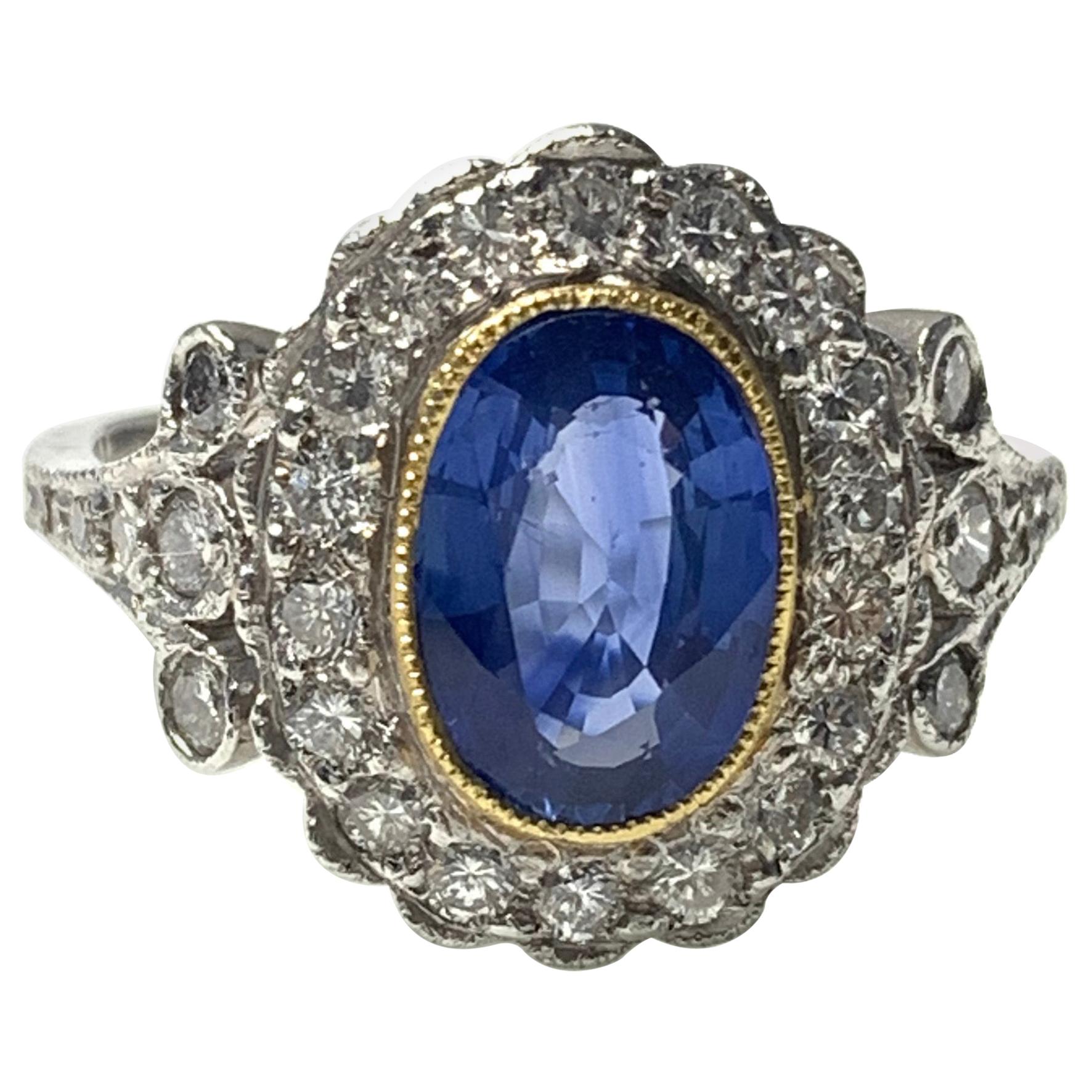 Blue Sapphire and Diamond Engagement Ring in Platinum