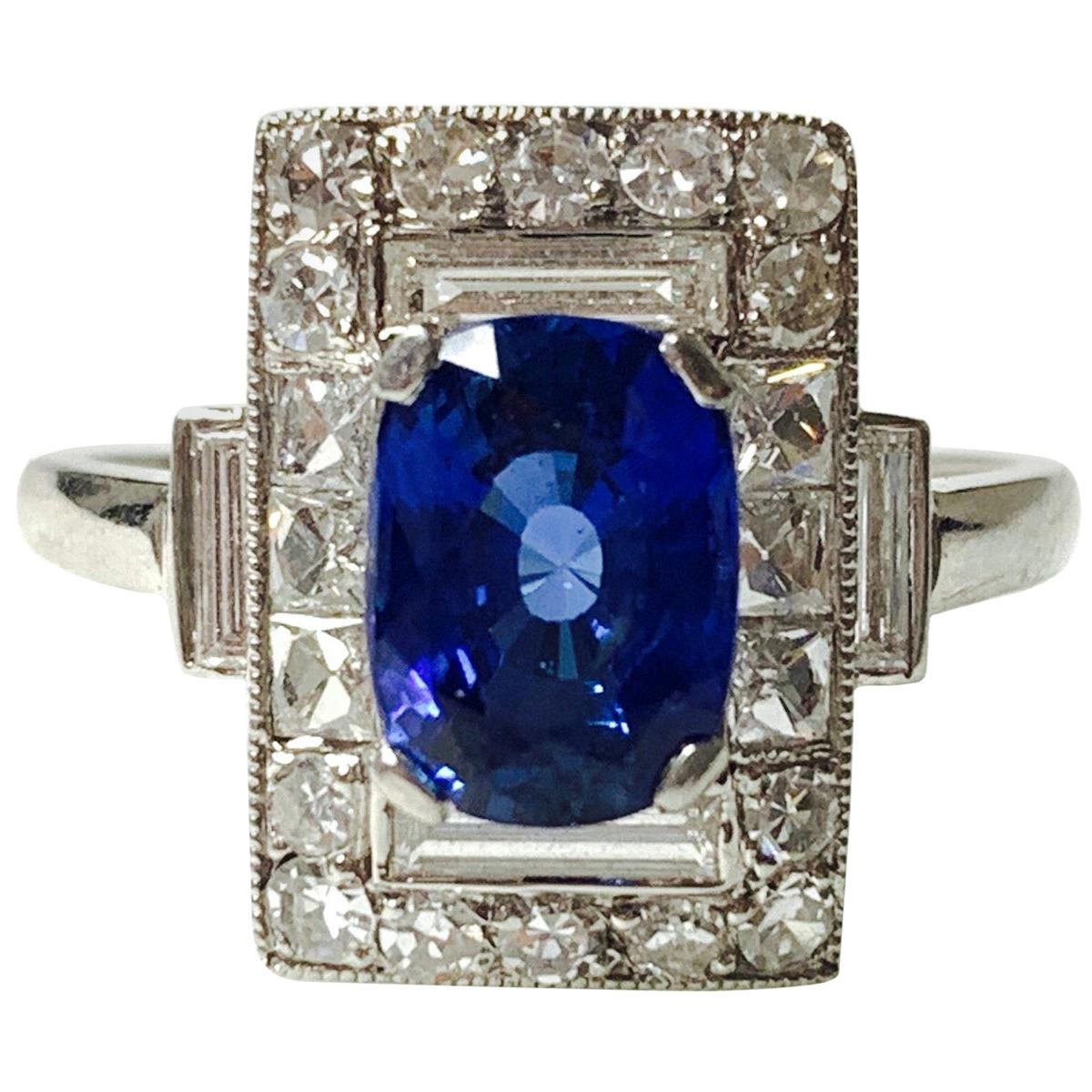 Bague de fiançailles en saphir bleu et diamant en platine