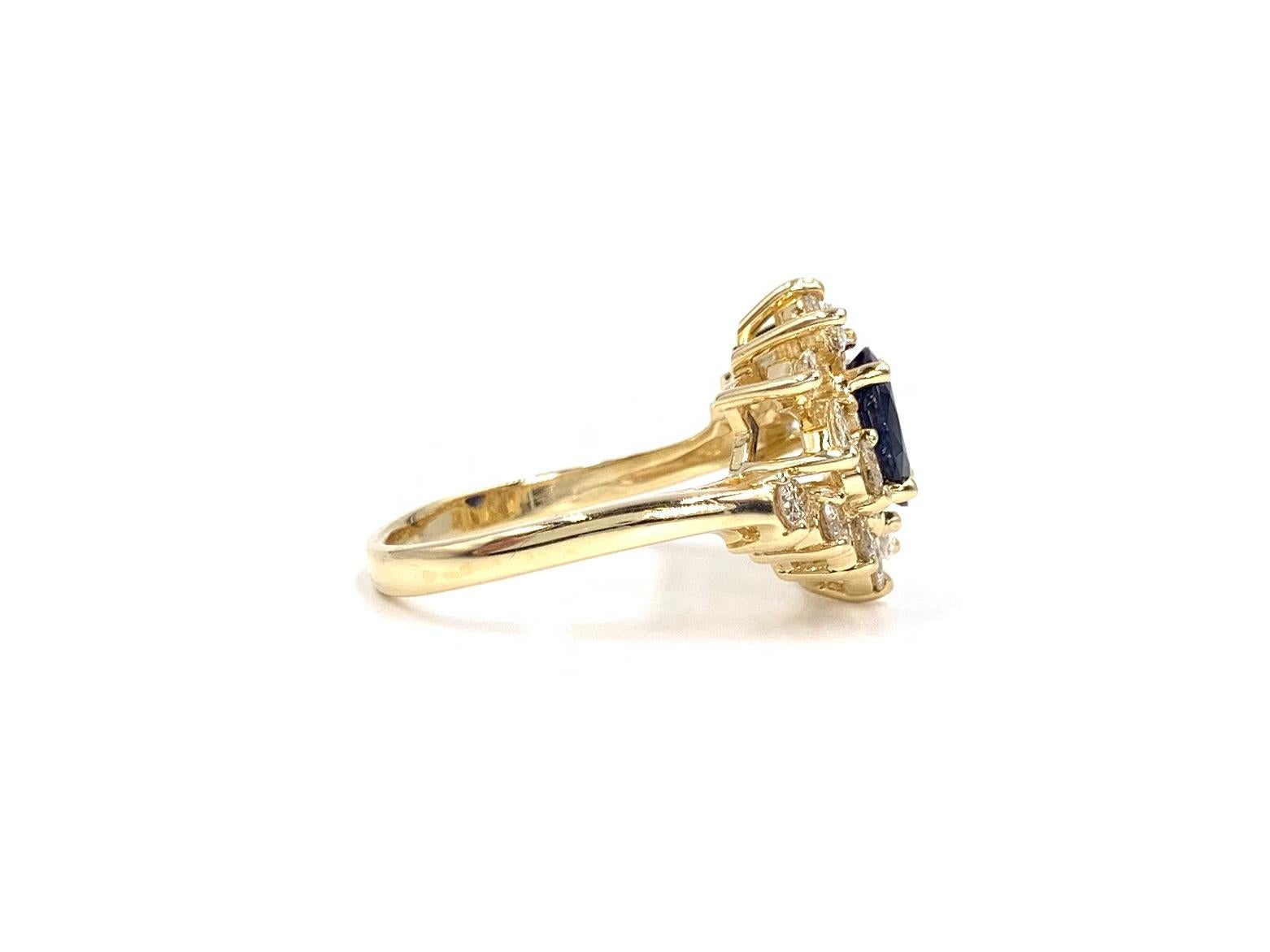 Blue Sapphire and Diamond Fancy Halo 14 Karat Yellow Gold Ring In Good Condition For Sale In Pikesville, MD