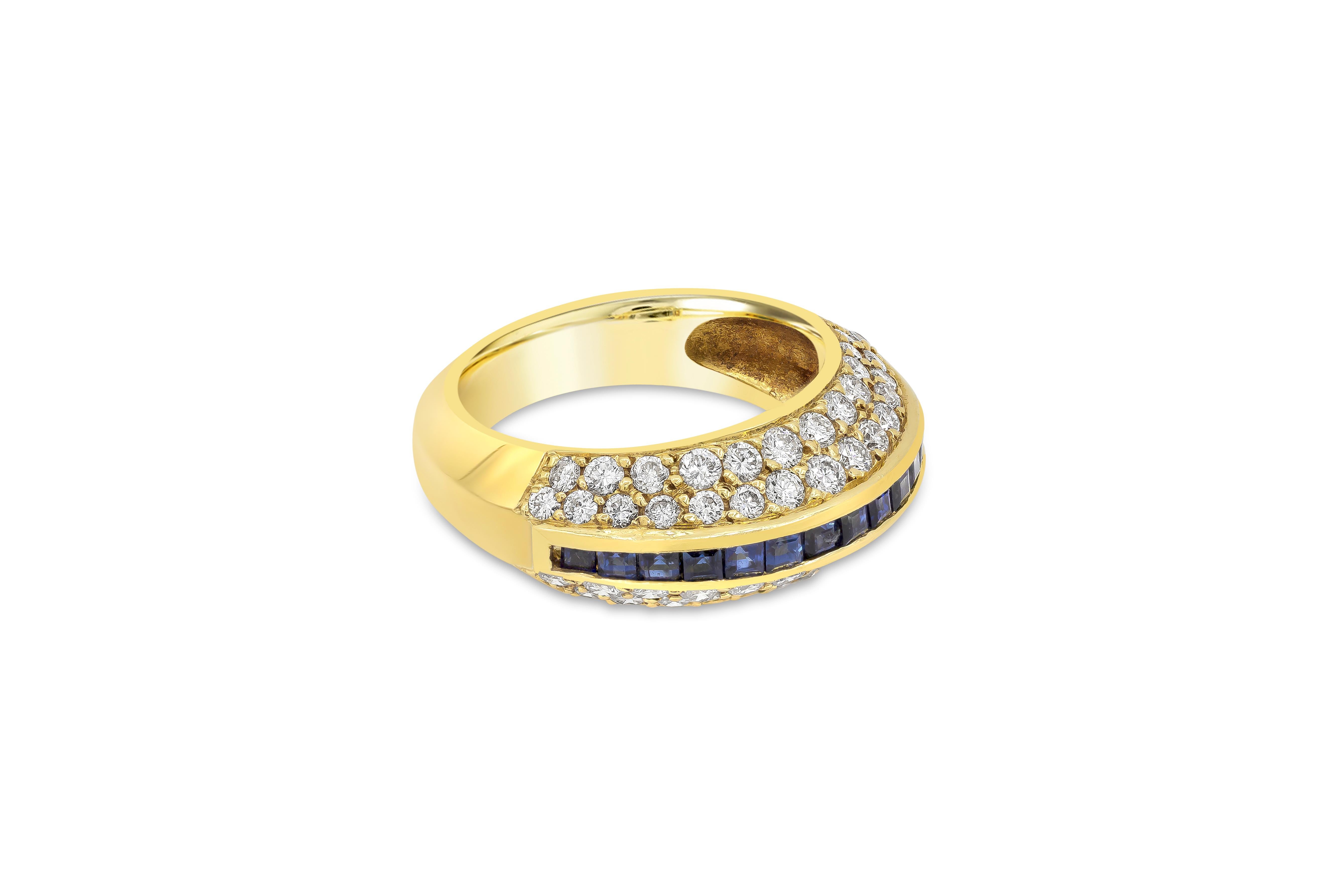 A unique and fashionable ring showcasing a row of square cut blue sapphires, set in a domed setting accented with round brilliant diamond weighing 2.01 carats total. Made in 18K Yellow Gold. Size 6.5 US resizable upon request and 9mm in