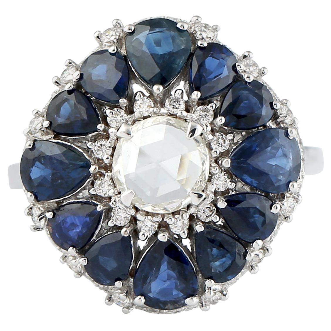 Blue Sapphire and Diamond Floral Ring in 18 Karat White Gold
