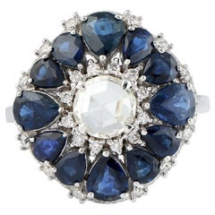 Bague florale en or blanc 18 carats avec saphir bleu et diamants