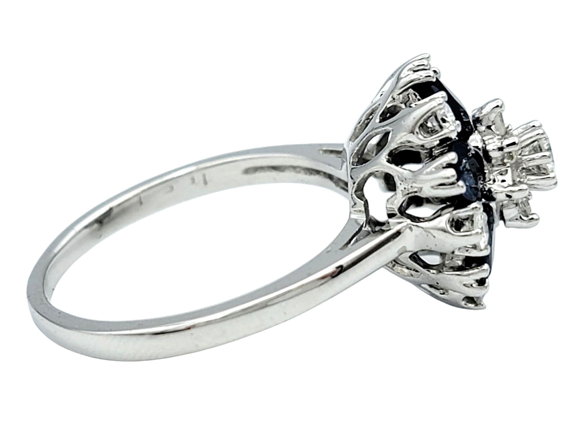 Contemporary Blue Sapphire and Diamond Flower Motif Cocktail Ring Set in 14 Karat White Gold For Sale