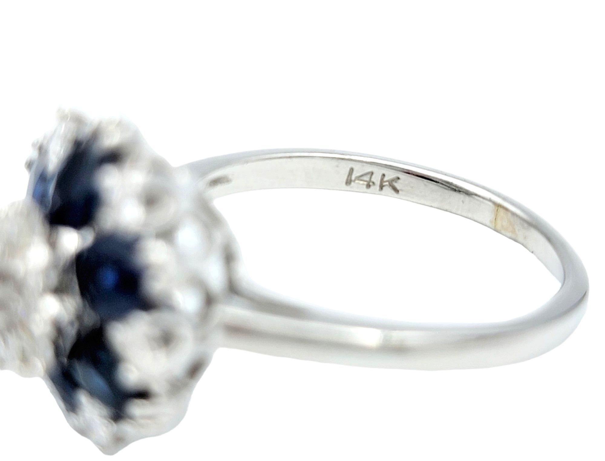 Blue Sapphire and Diamond Flower Motif Cocktail Ring Set in 14 Karat White Gold In Good Condition For Sale In Scottsdale, AZ