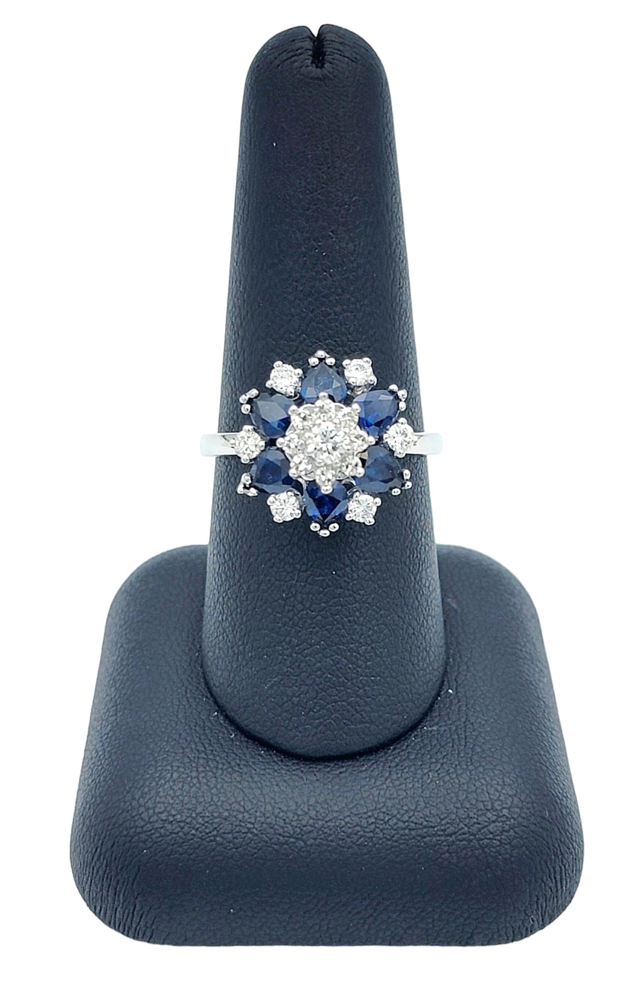Blue Sapphire and Diamond Flower Motif Cocktail Ring Set in 14 Karat White Gold For Sale 1