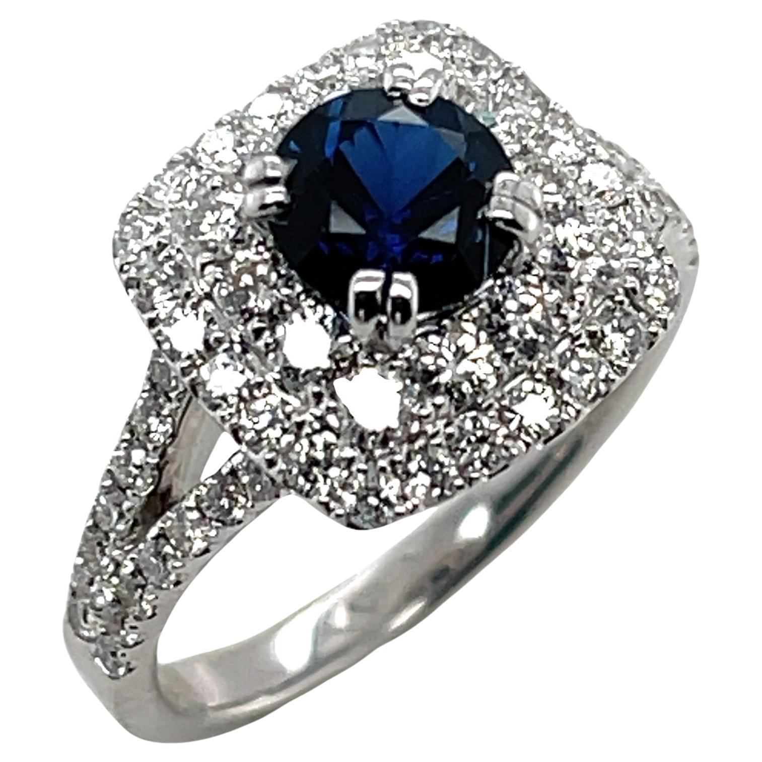 Blue Sapphire and Diamond Halo Cocktail Ring in 18k White Gold For Sale