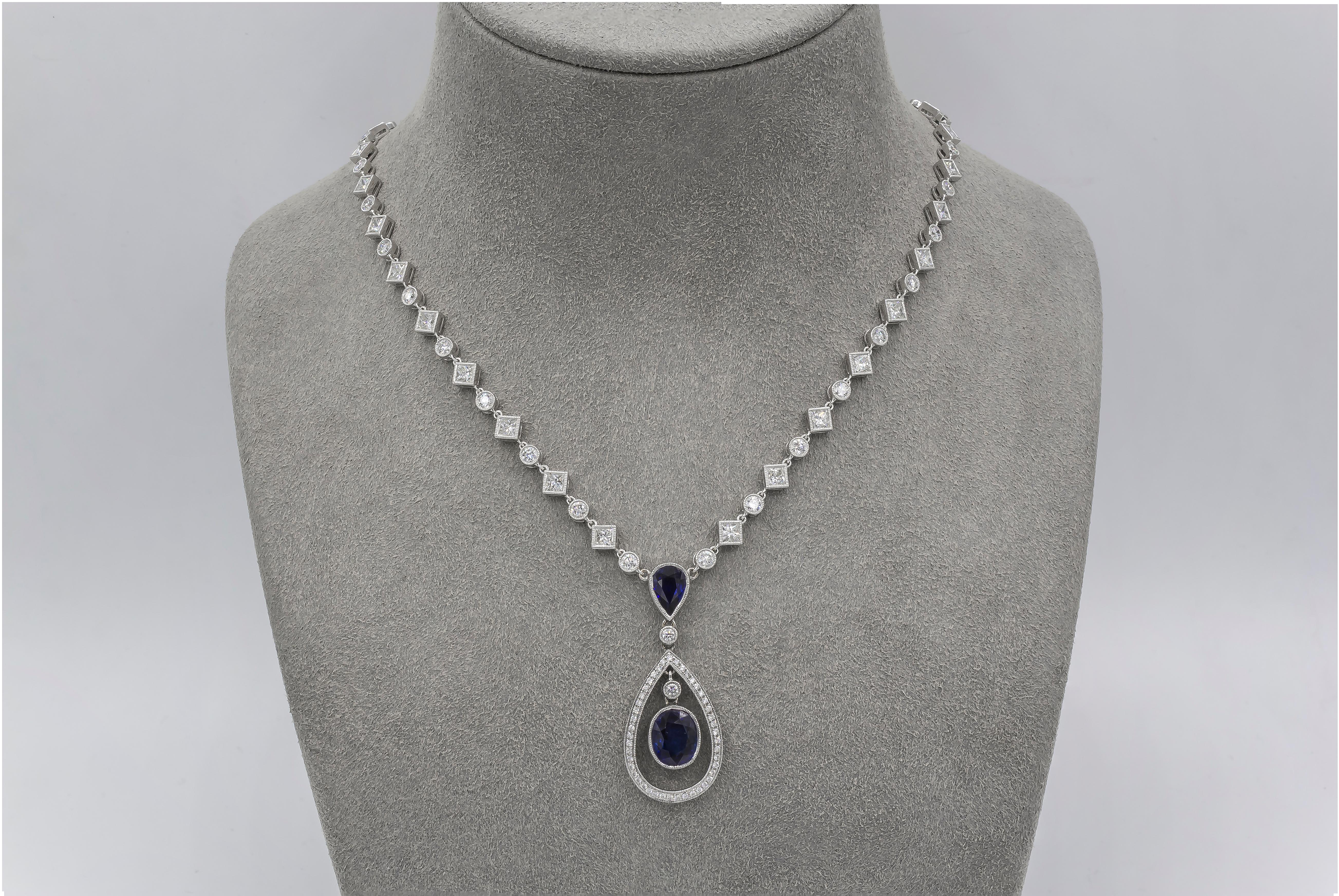 Contemporary Roman Malakov 4.29 Carats Total Blue Sapphire and Diamond Halo Drop Necklace For Sale