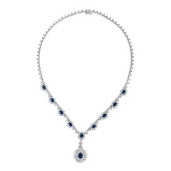 6.85 Carats Total Oval Cut Blue Sapphire & Diamond Halo Pendant Necklace
