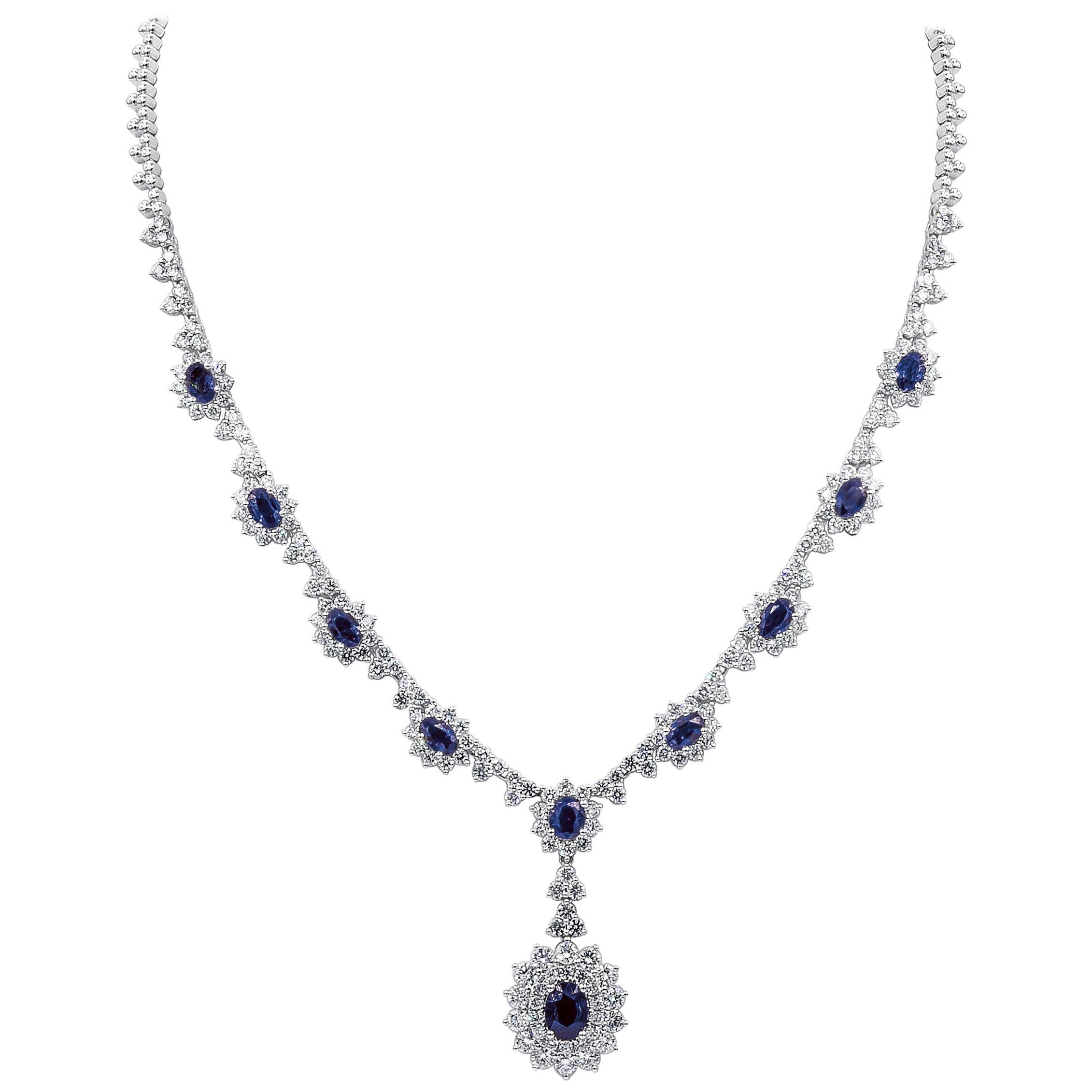 6.85 Carats Total Oval Cut Blue Sapphire and Round Diamond Halo Pendant Necklace For Sale