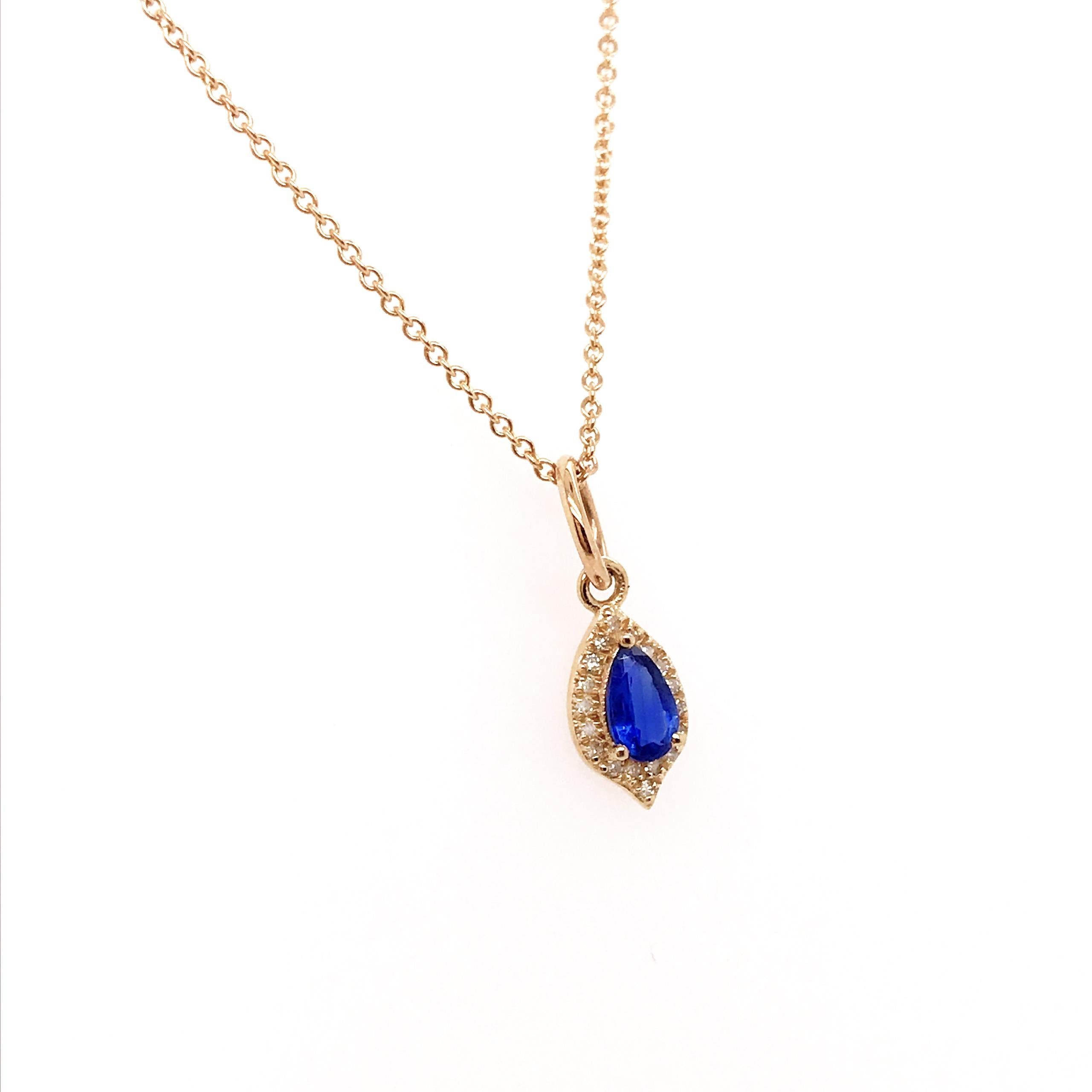 Blue Sapphire and Diamond Halo Pendant in 14 Karat Yellow Gold, Long Necklace In New Condition In Austin, TX