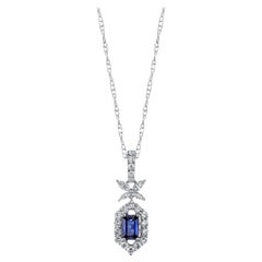 Blue Sapphire and Diamond Halo Pendant in White Gold with White Gold Chain