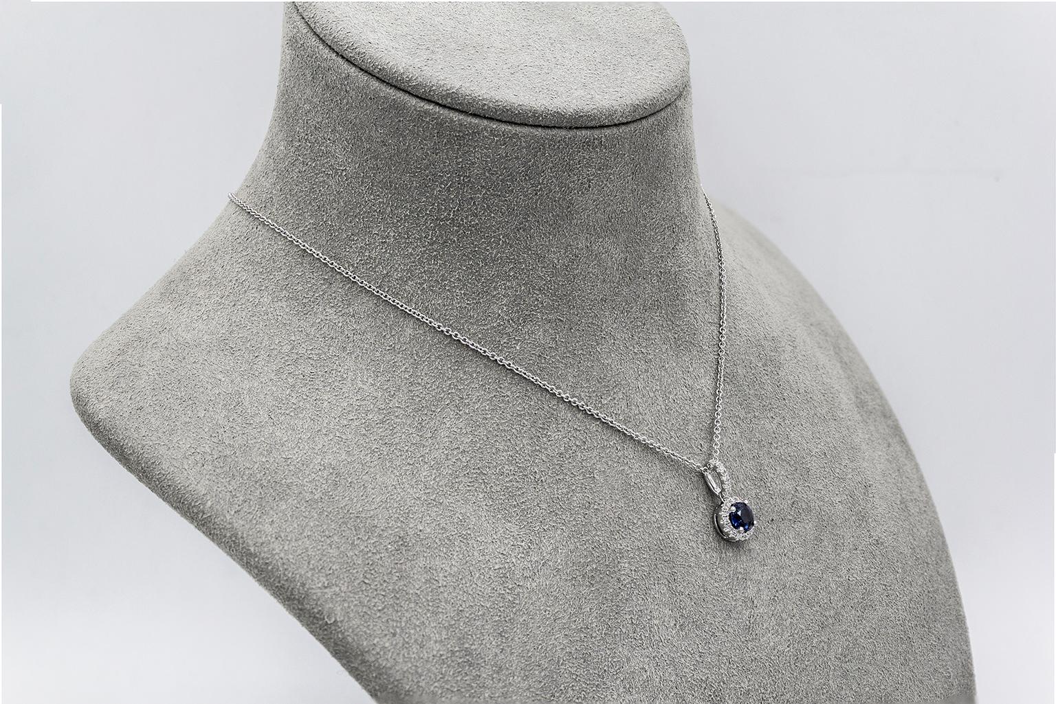 Contemporary Blue Sapphire and Diamond Halo Pendant Necklace