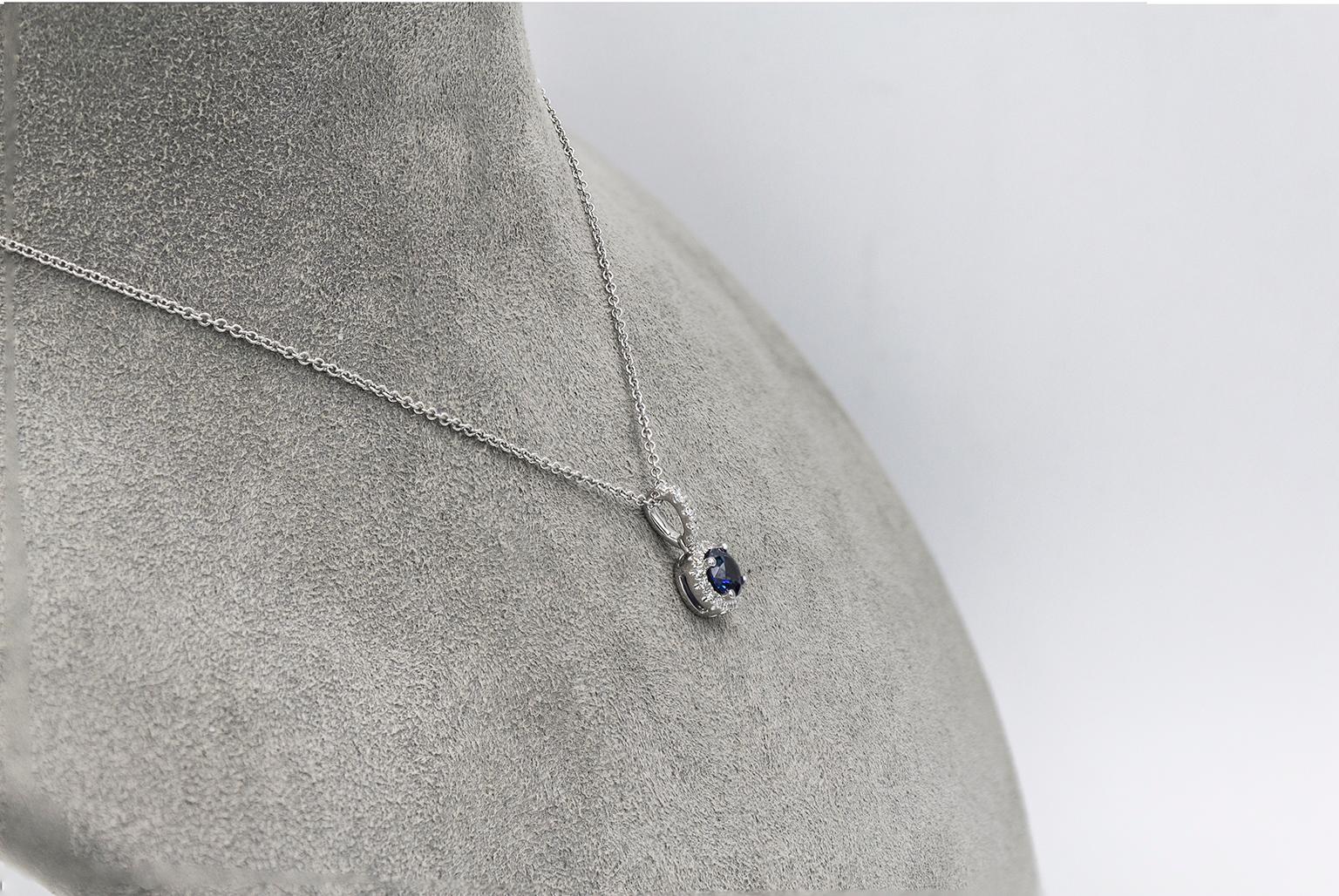 Round Cut Blue Sapphire and Diamond Halo Pendant Necklace