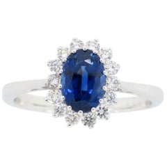 Blue Sapphire and Diamond Halo Ring