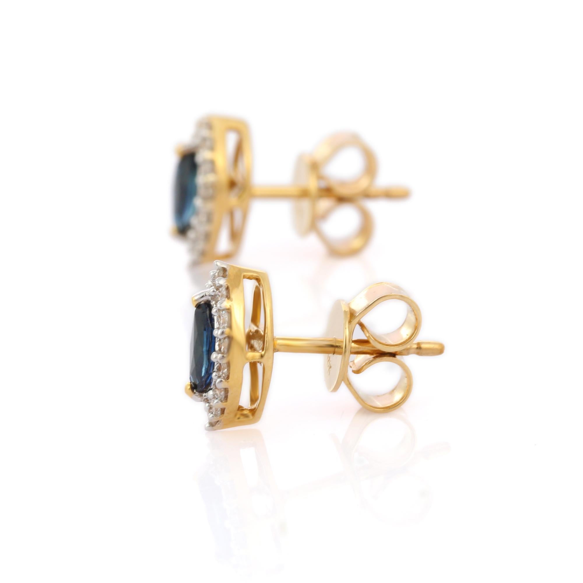 Marquise Cut Blue Sapphire and Diamond Halo Stud Earrings in 18K Yellow Gold For Sale
