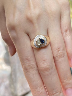 Blue Sapphire and Diamond Heart Ring set in 18K Gold Settings