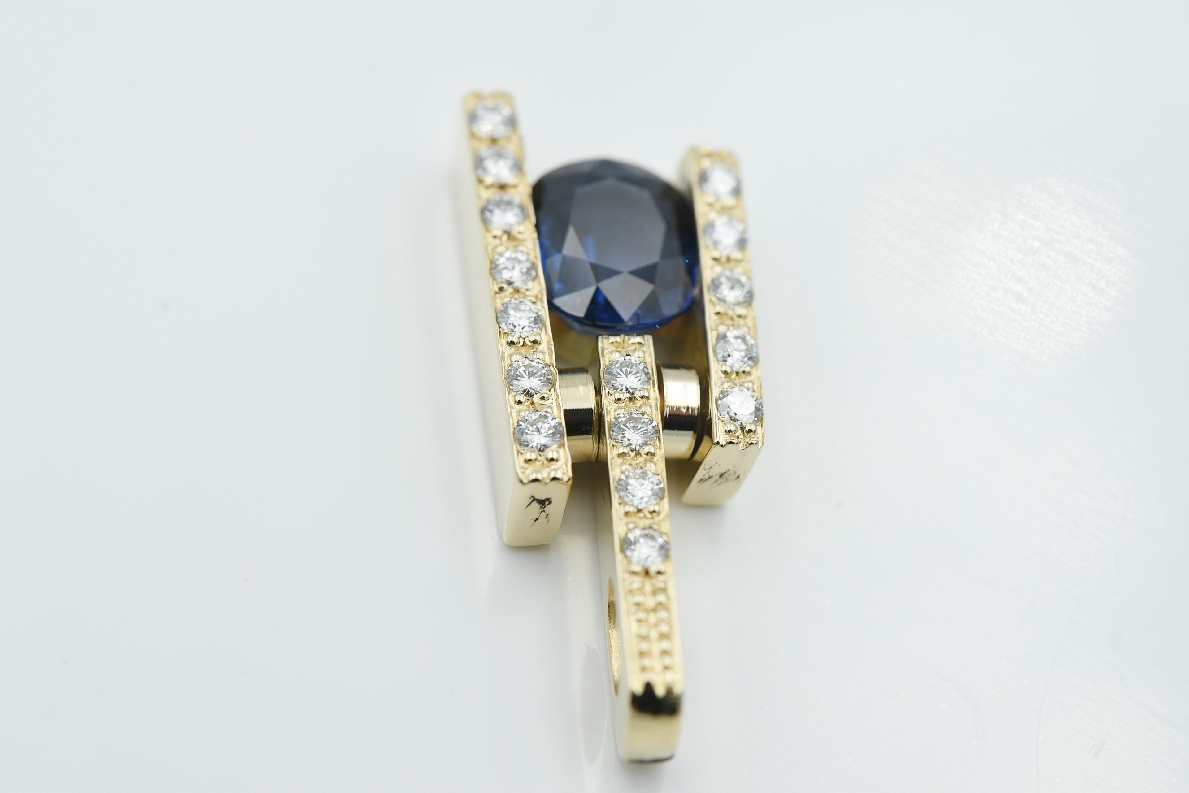 Oval Cut Blue Sapphire and Diamond Hinge Bale Pendant For Sale