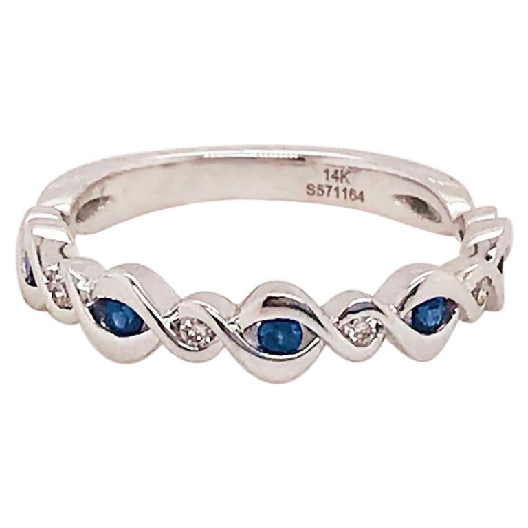 Anneau d'infini en or 14 carats avec saphir bleu et diamants de 0,20 carat (1/5 carat) en vente