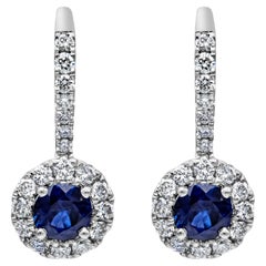 Blue Sapphire and Diamond Lever Back Halo Earrings in White Gold