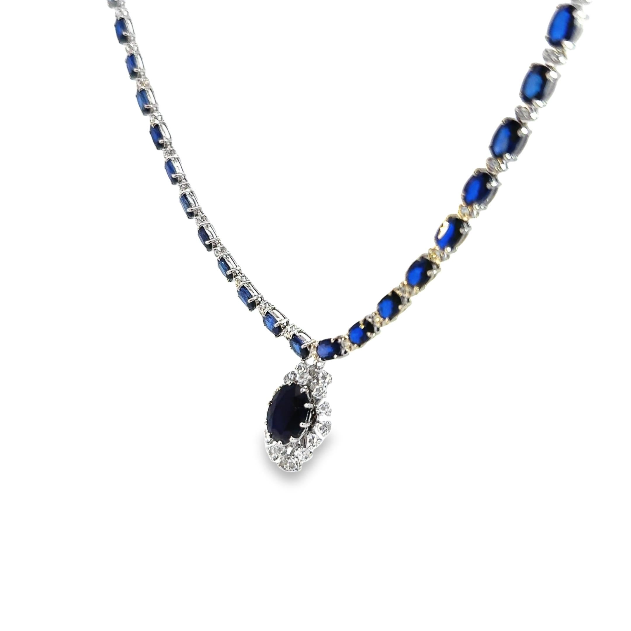 Item #8126

GGA (Gemassure Gemological Appraisals) Certified
14K Ladies Necklace 33.94 carat Blue Sapphire and 1.06 carat Diamonds 1.58 W. Sapphire

Fourteen karat (14K) white gold natural blue/white sapphire corundum and diamond necklace. Oval and