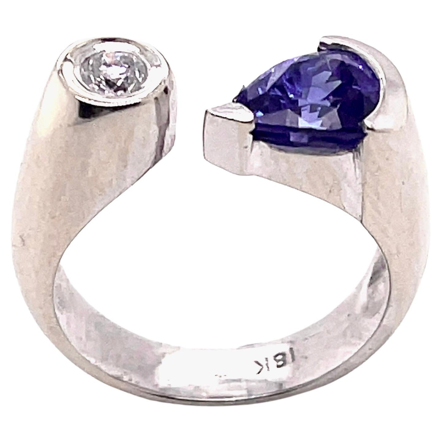 Blue Sapphire and Diamond open shank ring