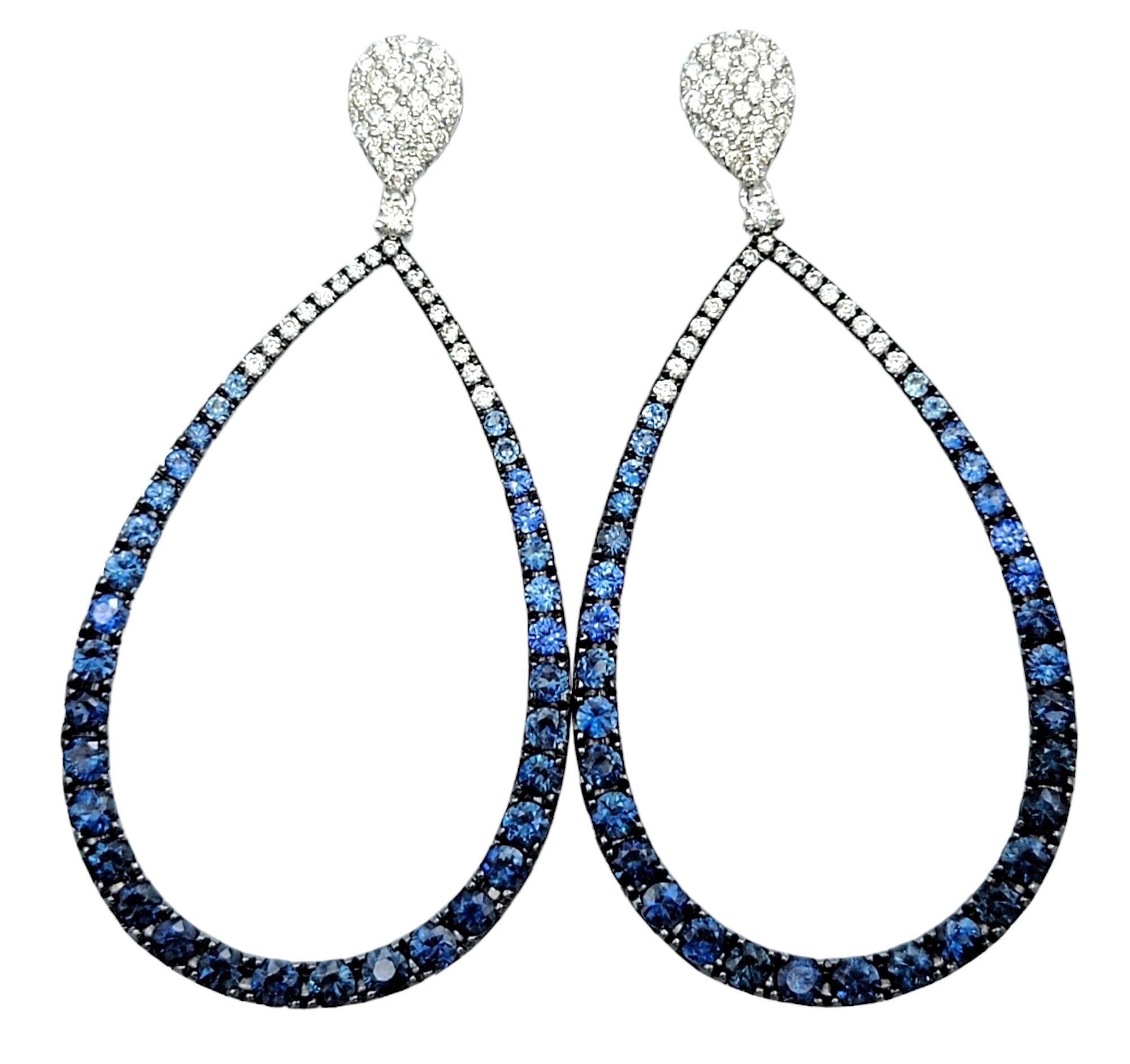 Contemporary Blue Sapphire and Diamond Open Teardrop Dangle Earrings in 14 Karat White Gold