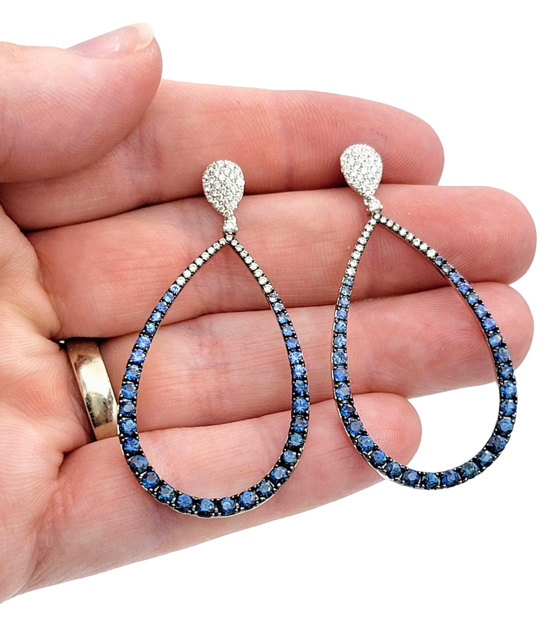 Women's Blue Sapphire and Diamond Open Teardrop Dangle Earrings in 14 Karat White Gold