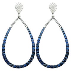 Blue Sapphire and Diamond Open Teardrop Dangle Earrings in 14 Karat White Gold