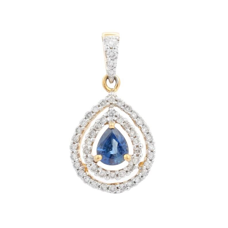 Diamond Blue Sapphire Pendant in 18K Gold studded with pear cut sapphire and round cut diamonds. This stunning piece of jewelry instantly elevates a casual look or dressy outfit. 
Sapphire stimulate concentration and reduces stress.
Designed with
