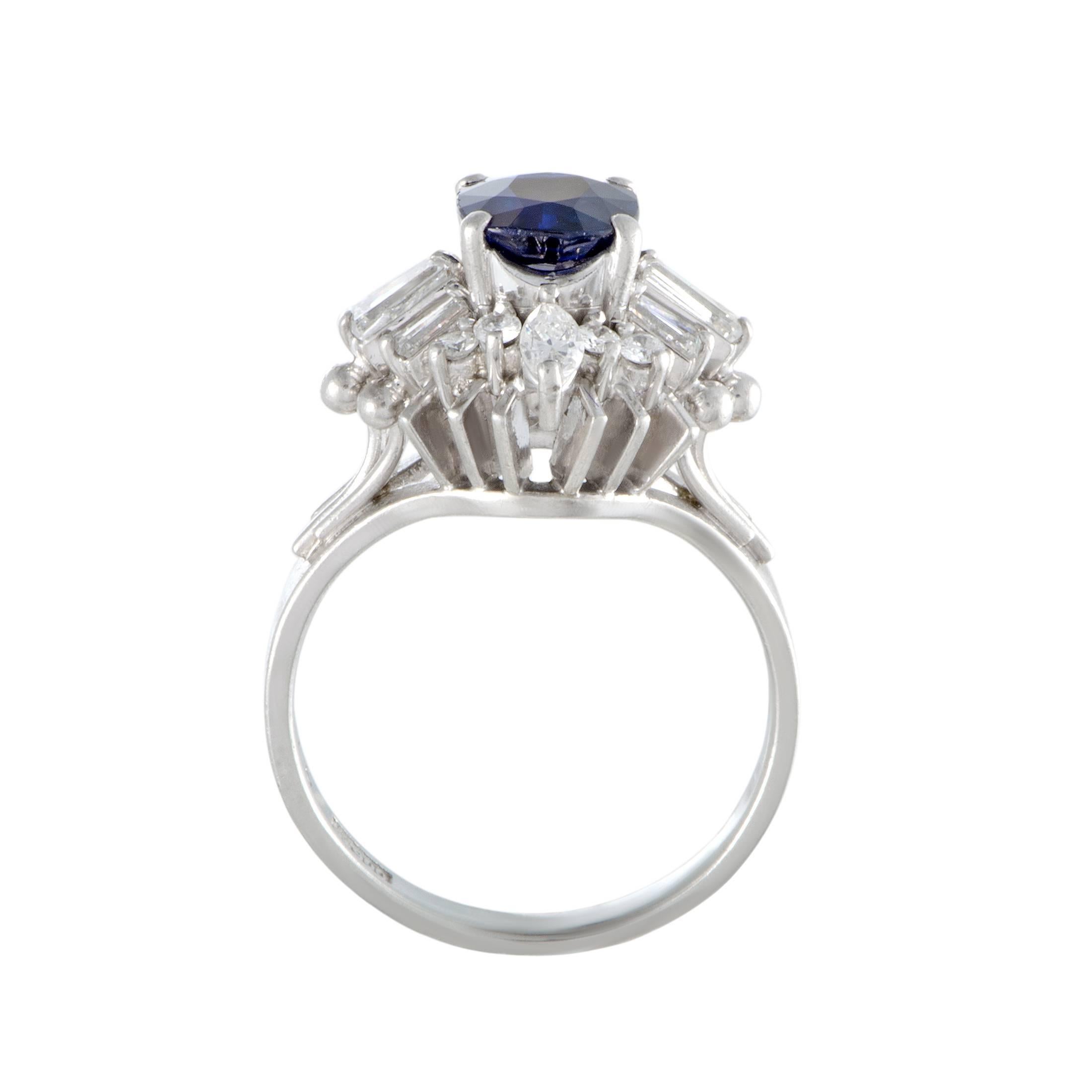 The ever-regal sapphire creates a compellingly prestigious sight with the lustrous diamonds in this sumptuous ring that is splendidly made of luxurious platinum. The sapphire weighs 1.06 carats and it is accentuated by a total of 0.61 carats of