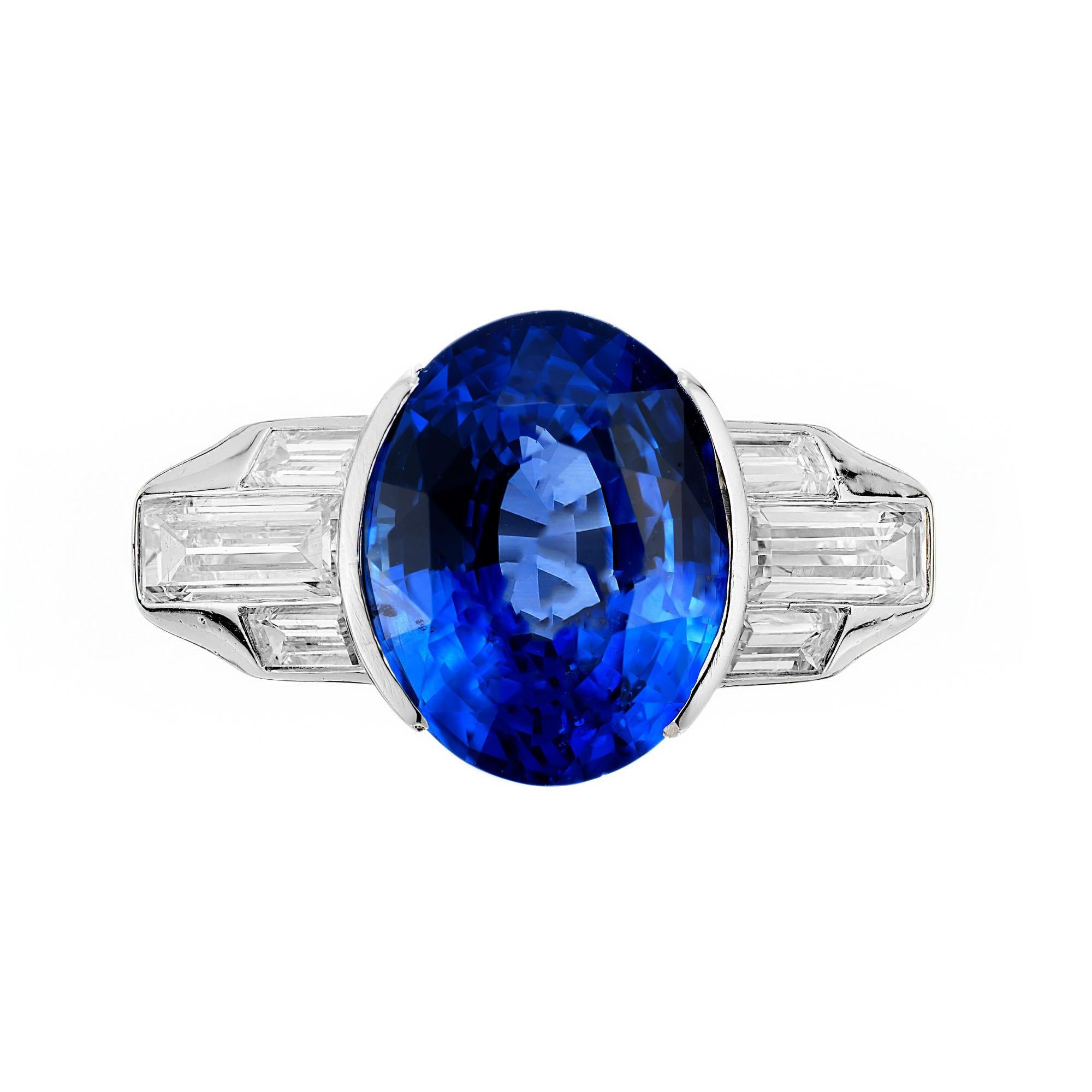 Semi bezel center Blue Sapphire natural corundum, simple heat only no other enhancements.  a surface area of 12.45 x 9.72mm,

1 oval bright cornflower blue Ceylon Sapphire, approx. total weight 6.02cts, Ceylon origin, natural color, simple heat