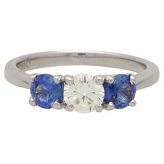 Blue Sapphire and Diamond Reverse Three Stone Ring Set in Platinum