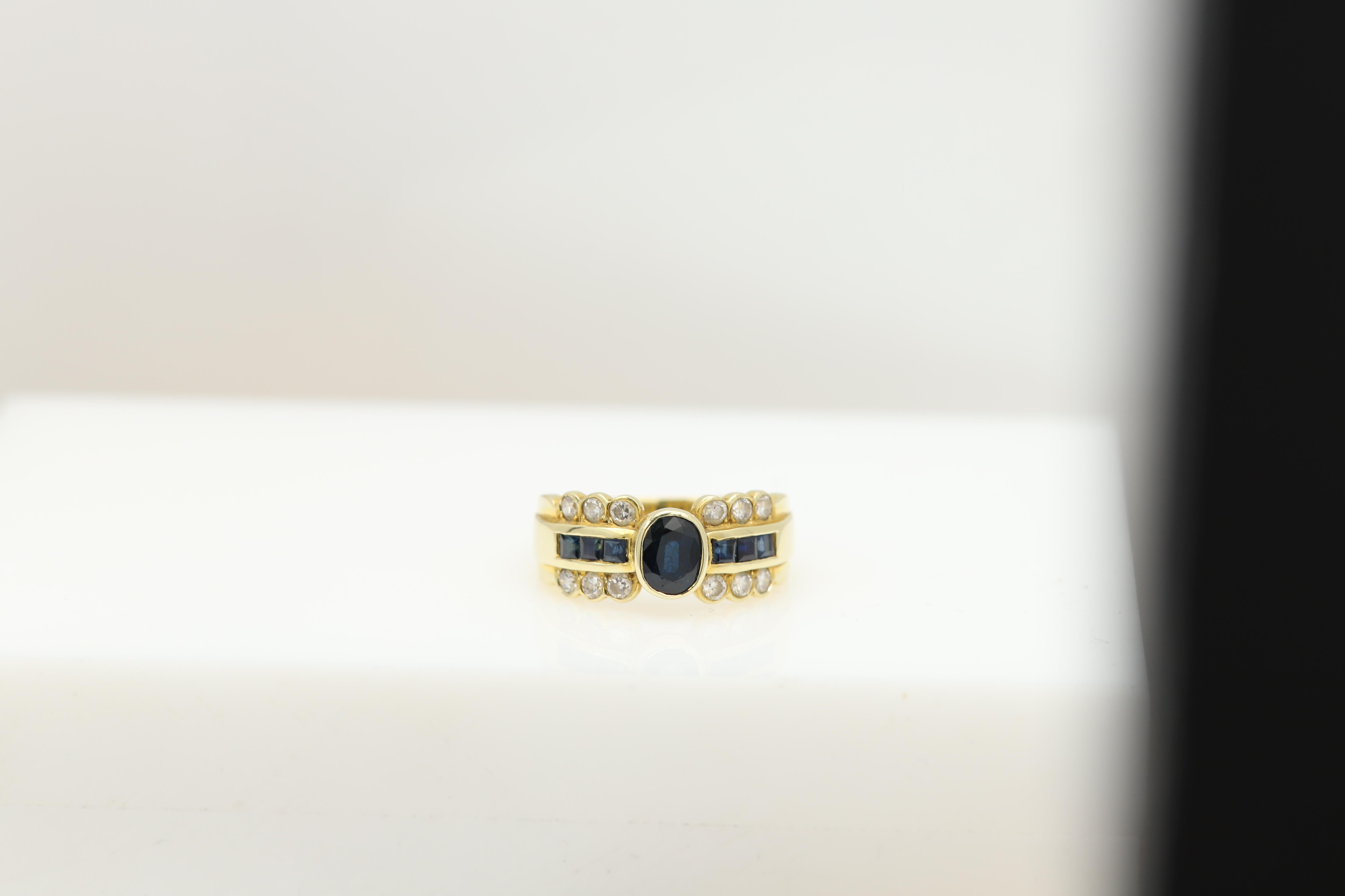 Elegant Classical ring
Center is natural  Blue Sapphire. 
and all other stones are Natural
14k  Yellow Gold  approx weight 5.80 grams
Center sapphire oval shape approx - 0.70 carat  (7x5mm)
Small Diamonds on the side total  0.45 carat G-SI-VS
Small