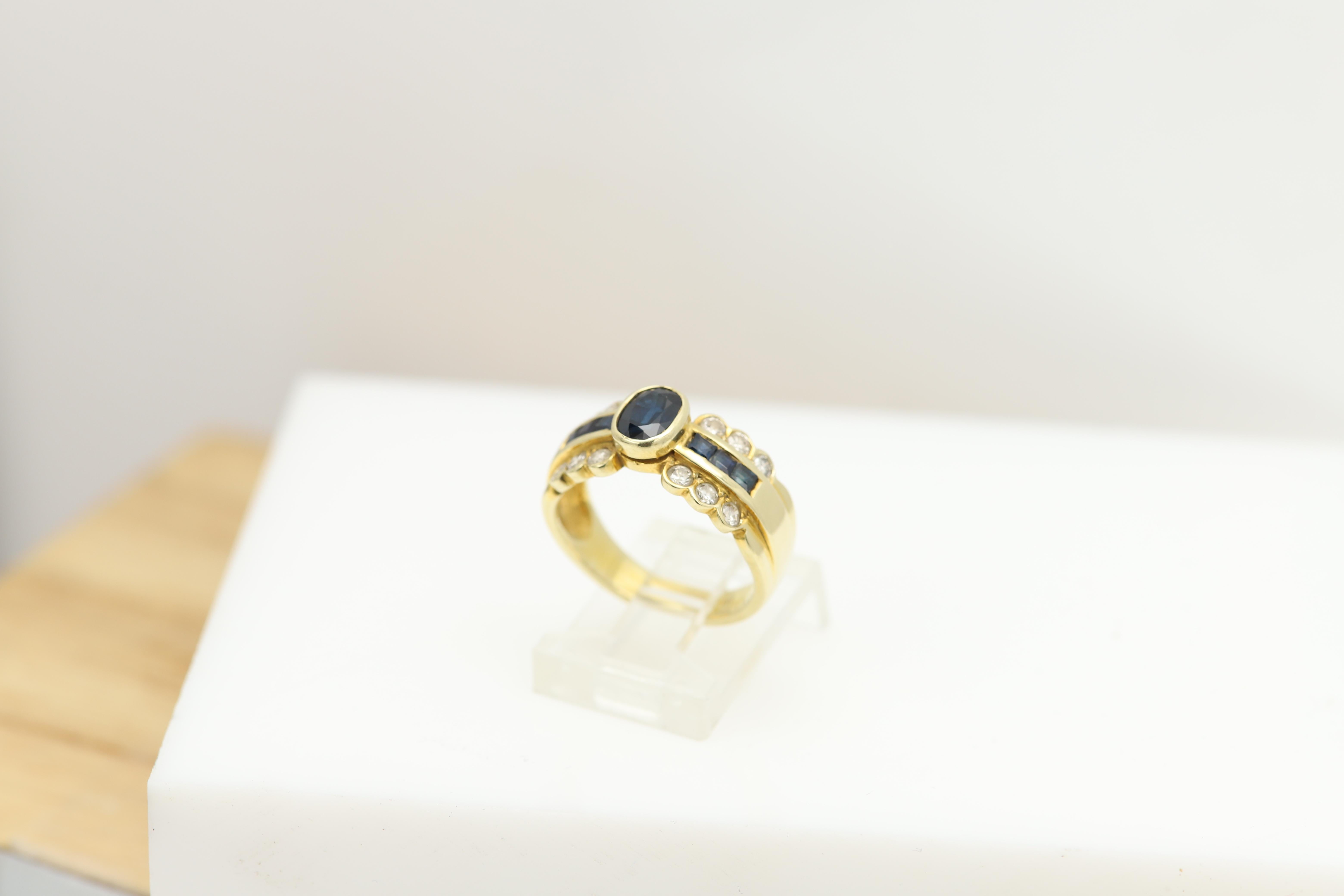 Oval Cut Blue Sapphire and Diamond Ring 14 Karat Gold For Sale