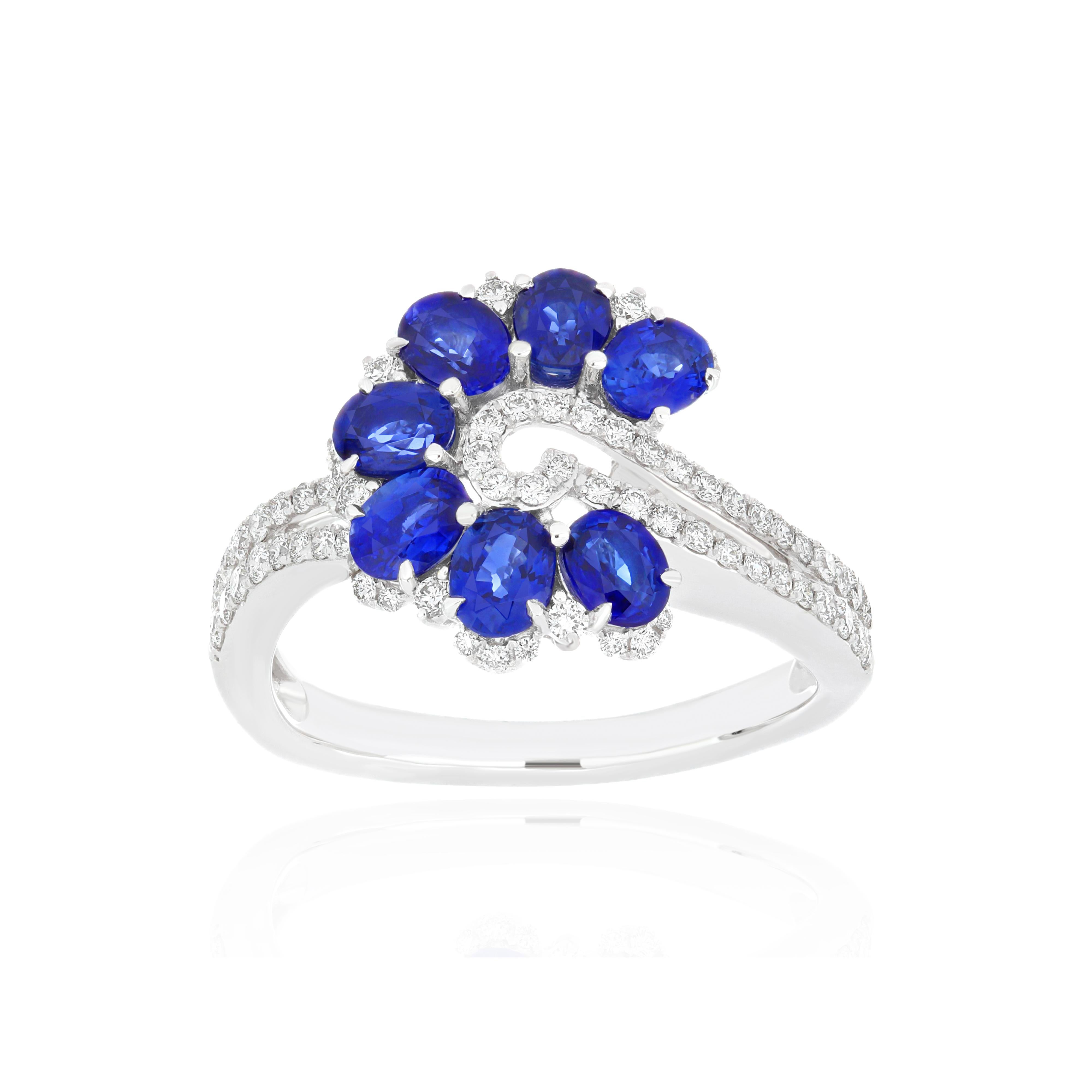 Oval Cut Blue Sapphire and Diamond Beautifully Hand crafted in 18 Karat White Gold Ring  For Sale