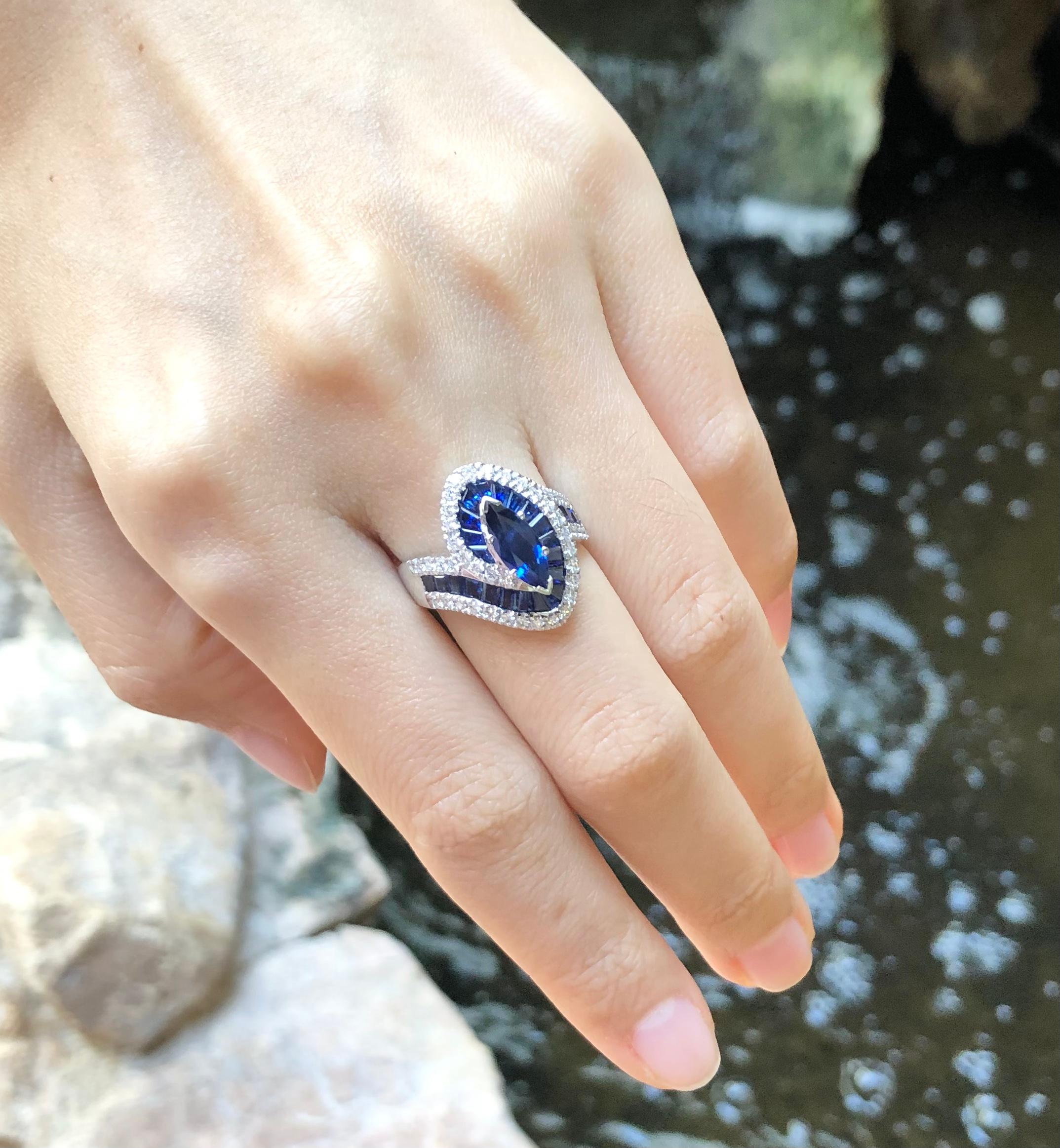 Blue Sapphire 1.01 carats, Blue Sapphire 2.23 carats and Diamond 0.51 carat Ring set in 18 Karat White Gold Settings

Width:  2.0 cm 
Length: 1.9 cm
Ring Size: 52
Total Weight: 7.99 grams

