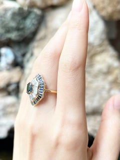 Blue Sapphire and Diamond Ring set in 18K Gold Settings