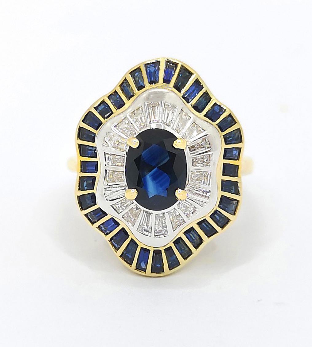 Ring mit blauem Saphir und Diamant in 18 Karat Goldfassungen gefasst im Angebot 1