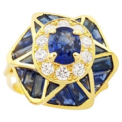 Bague en or 18 carats avec saphir bleu et diamant