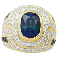Blue Sapphire and Diamond Ring set in 18K Gold Settings