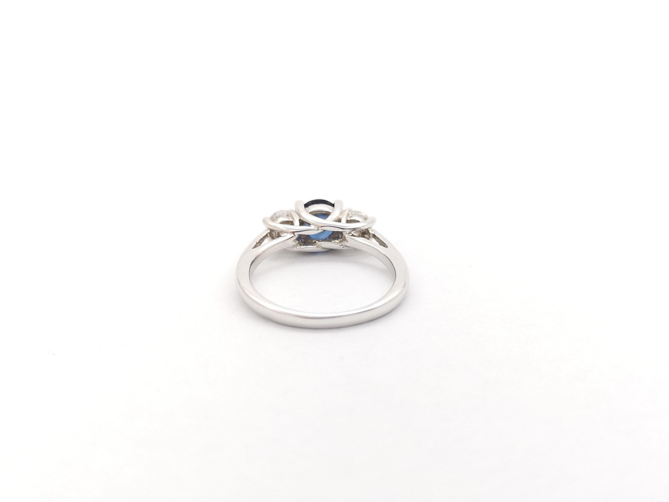 Blue Sapphire and Diamond Ring set in 18K White Gold Settings For Sale 4