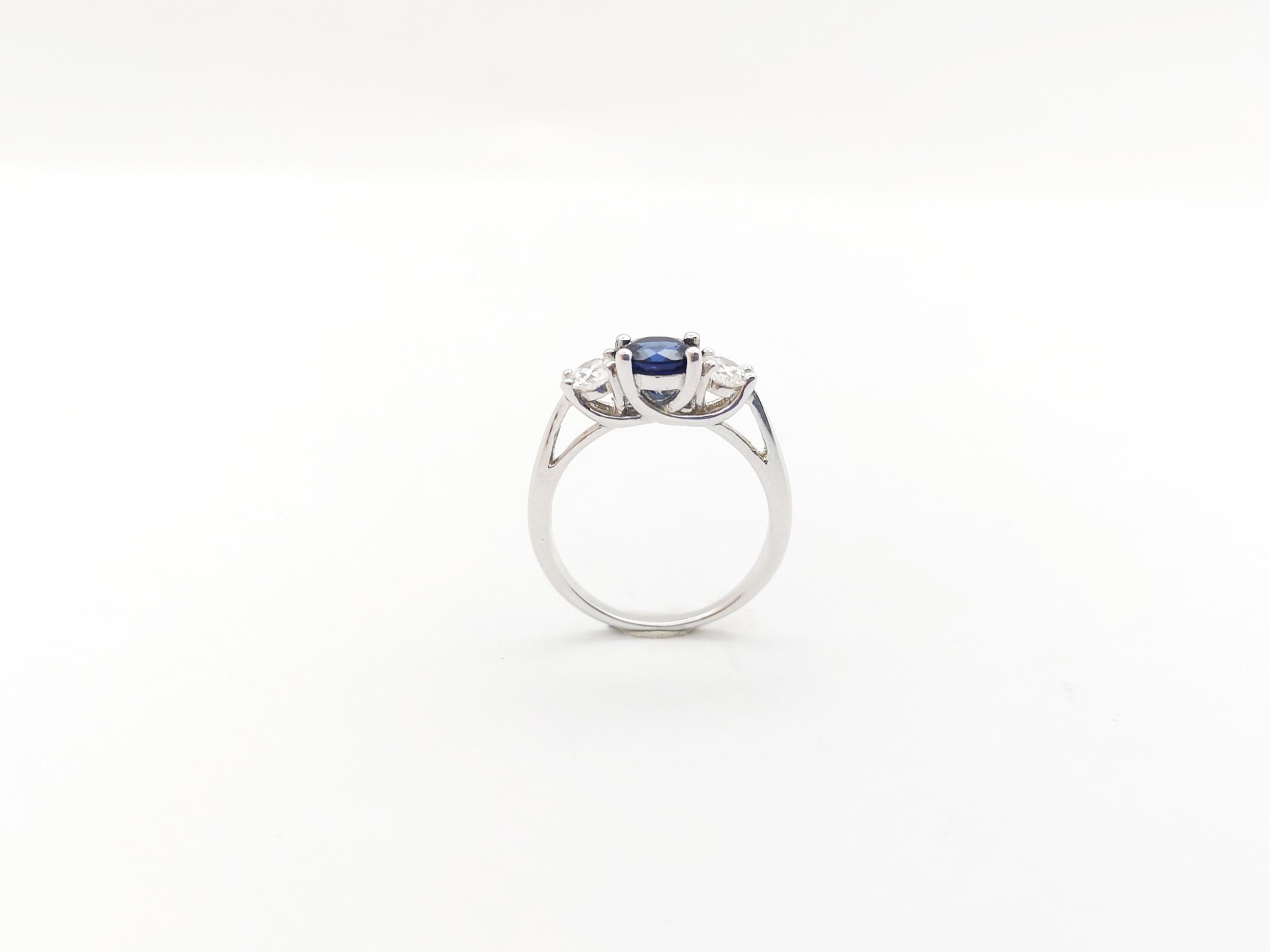 Blue Sapphire and Diamond Ring set in 18K White Gold Settings For Sale 5